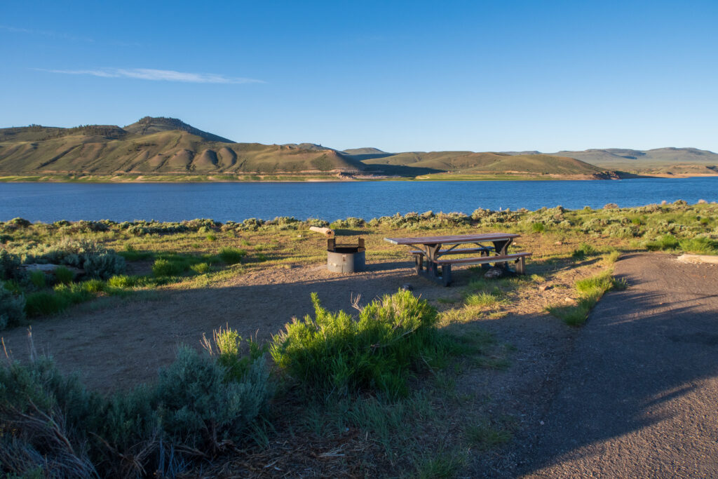 mountains and a lake in Colorado near a RV camp site. 